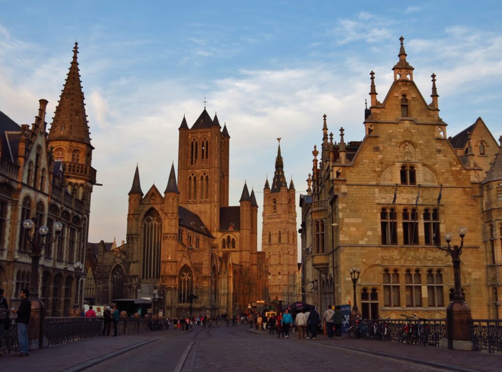 A cathedral, tower, and other spired buildings in Ghent, Belgium.