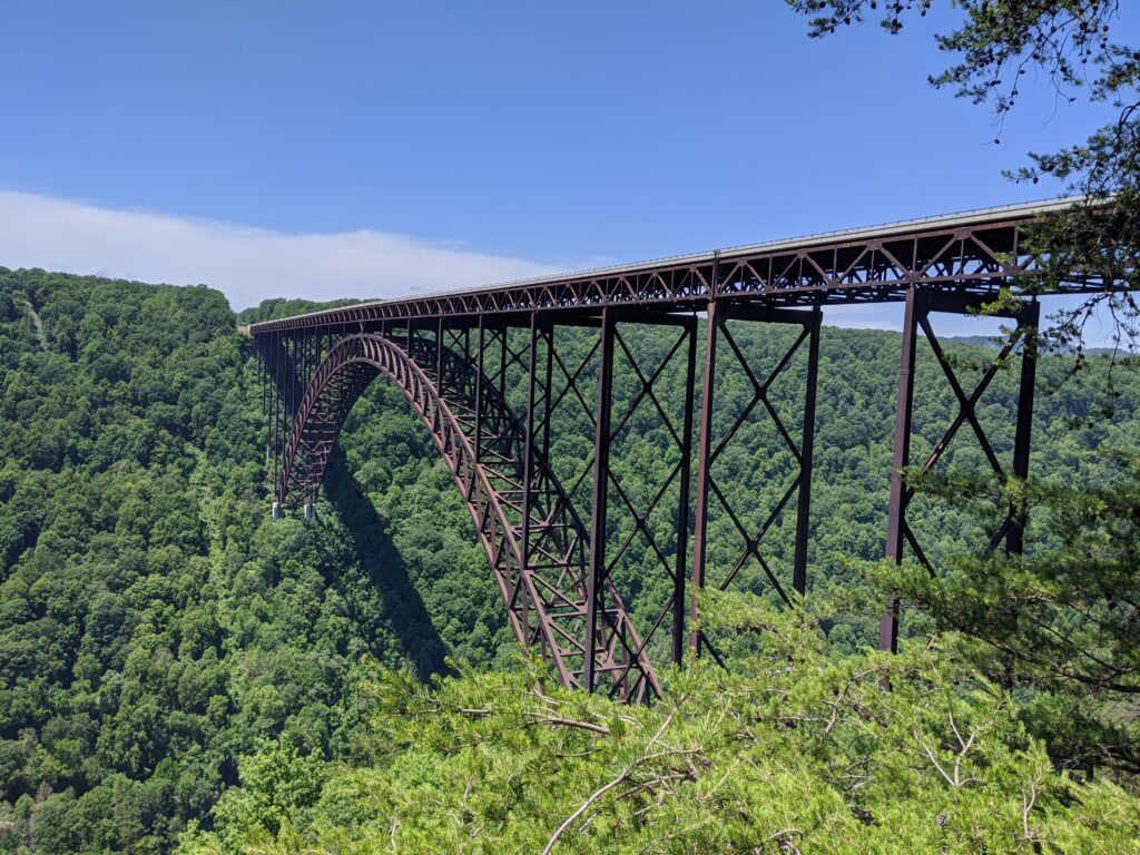 The New River Gorge ridge spanning across a forested valley
