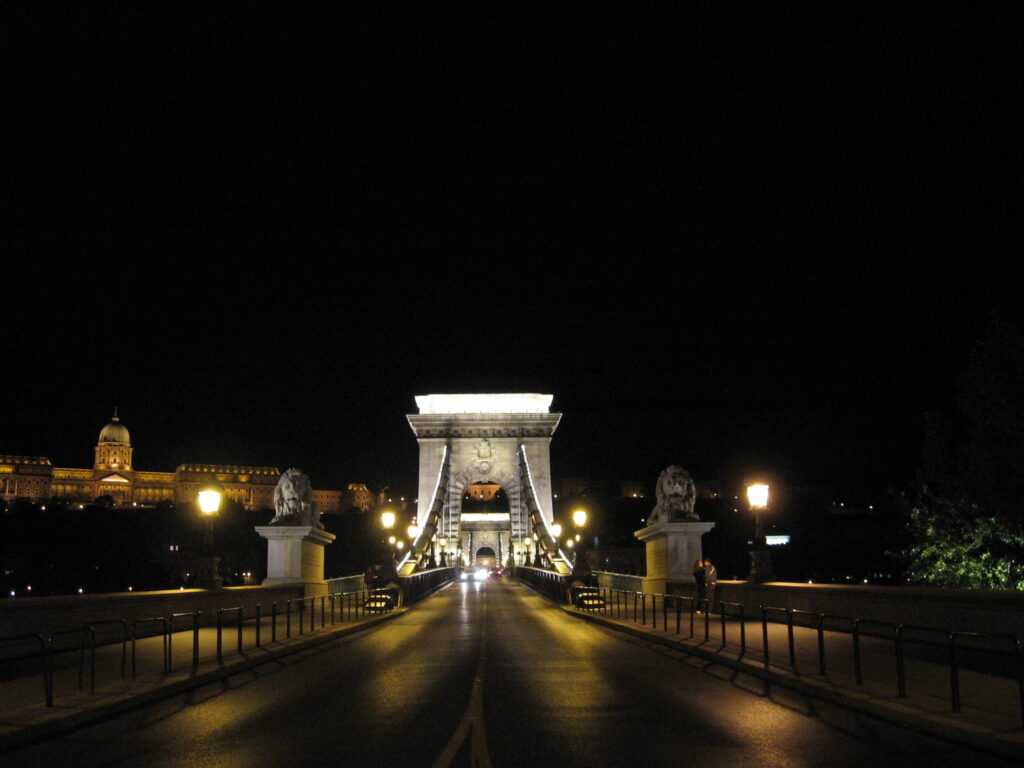 A straight-on view of the Chain Bridge in Budapest at night