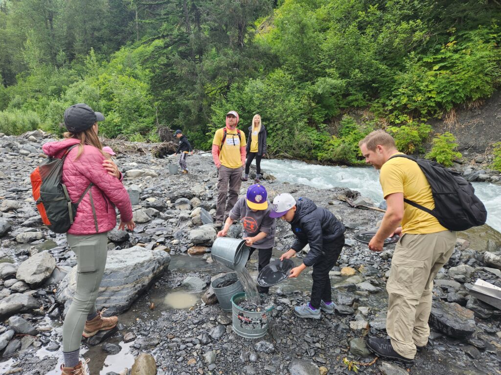 Kids and adults mining for gold in Girdwood