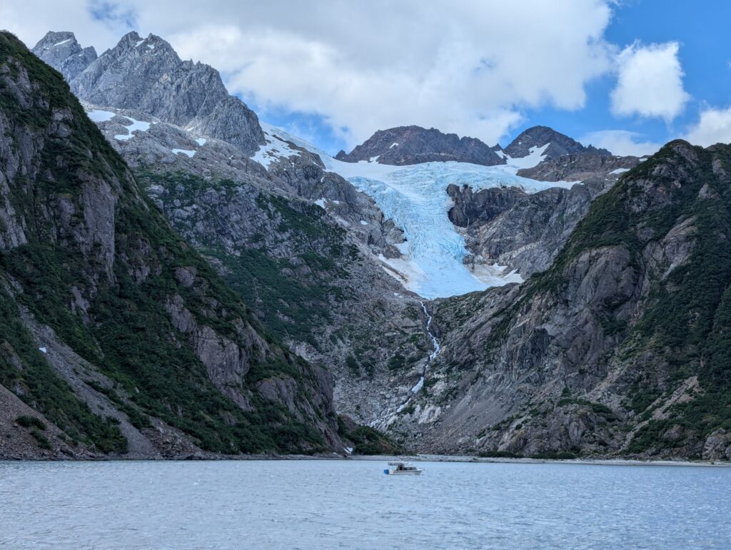 A hanging glacier on gray mountains in Kenai Fjords National Park