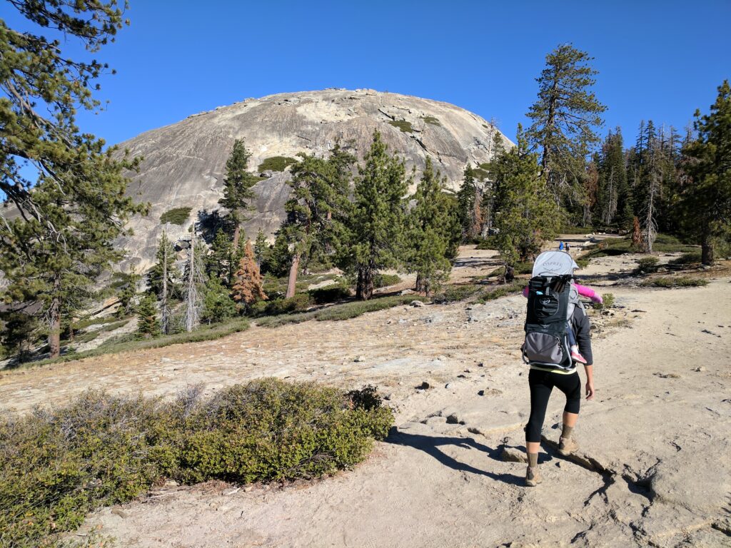 A hiker approaches Sentinel Dome in Yosemite National Park